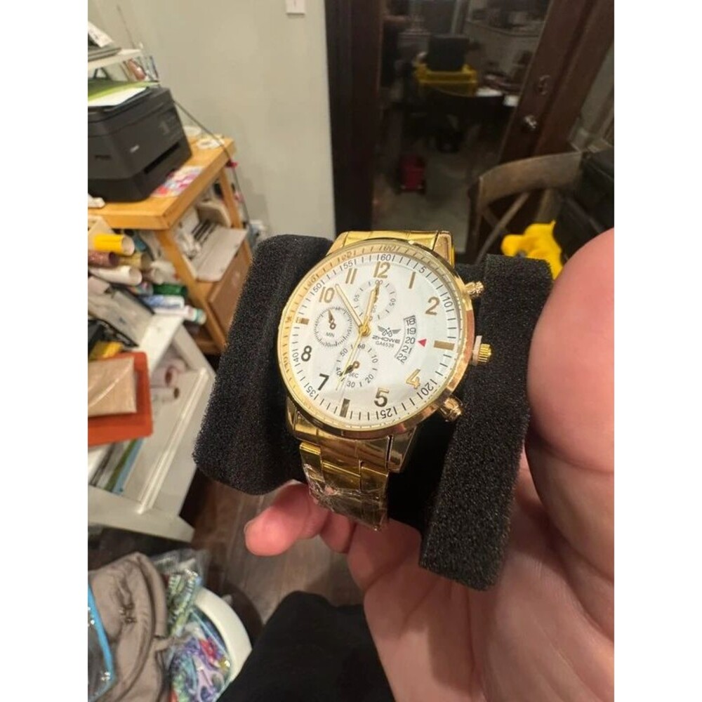 Gold white face budget watch
